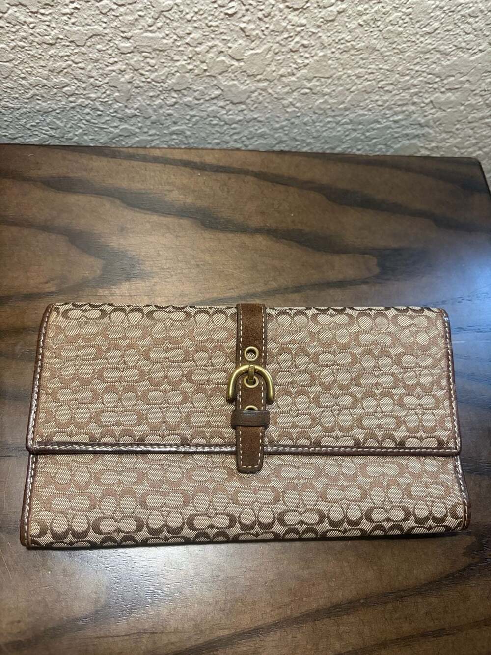 Coach Signature Canvas Tri-Fold Wallet with Buckle Closure